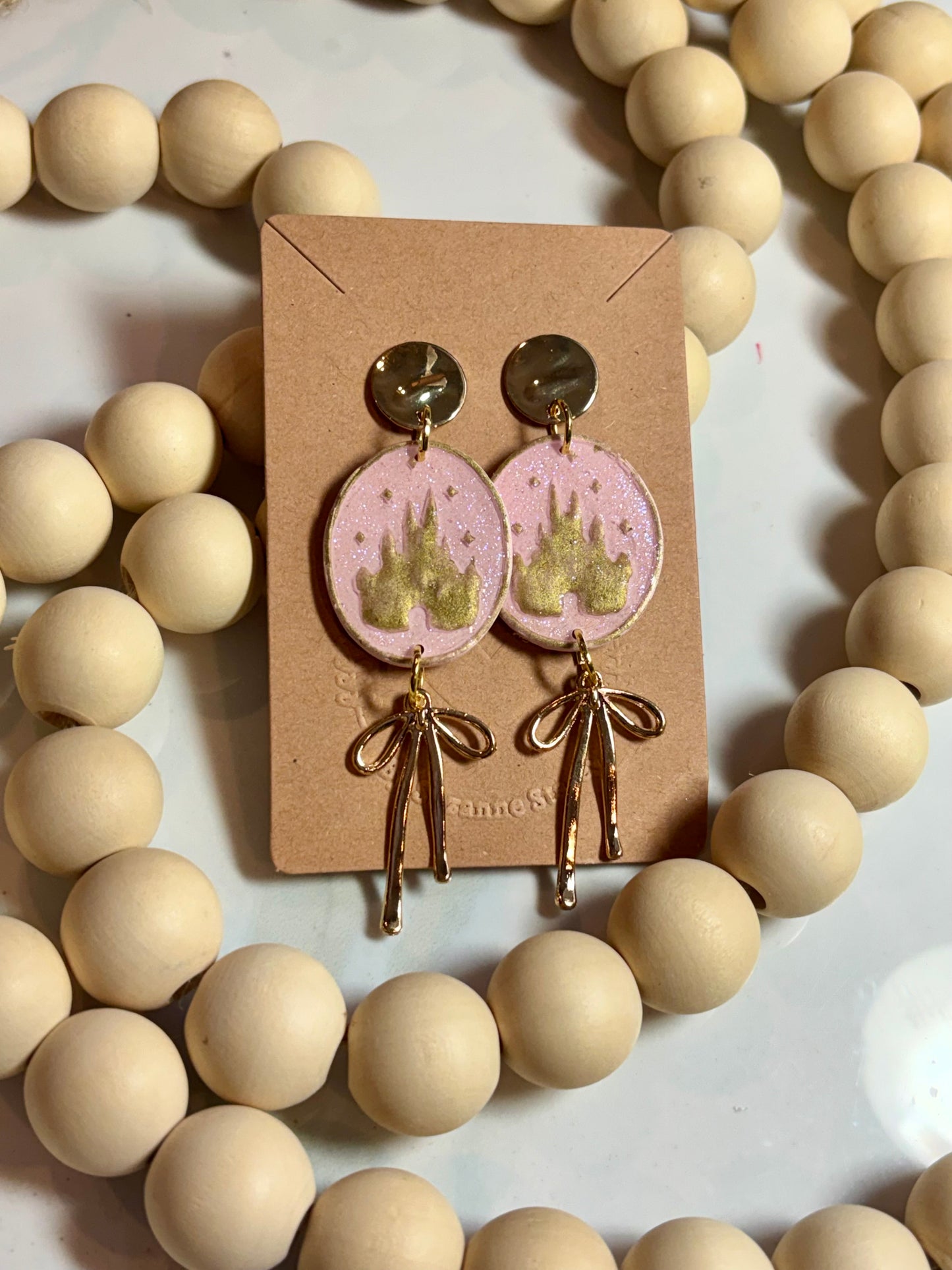 Pink and gold castle clay earrings