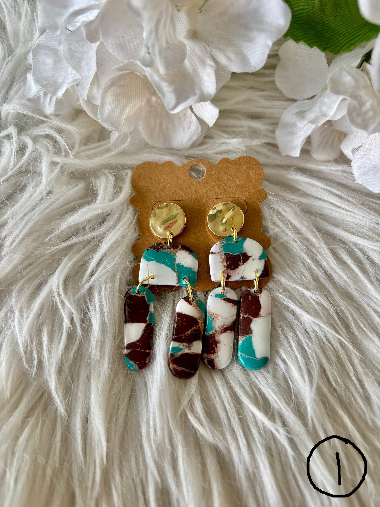 Turquoise, brown and white clay earring collection