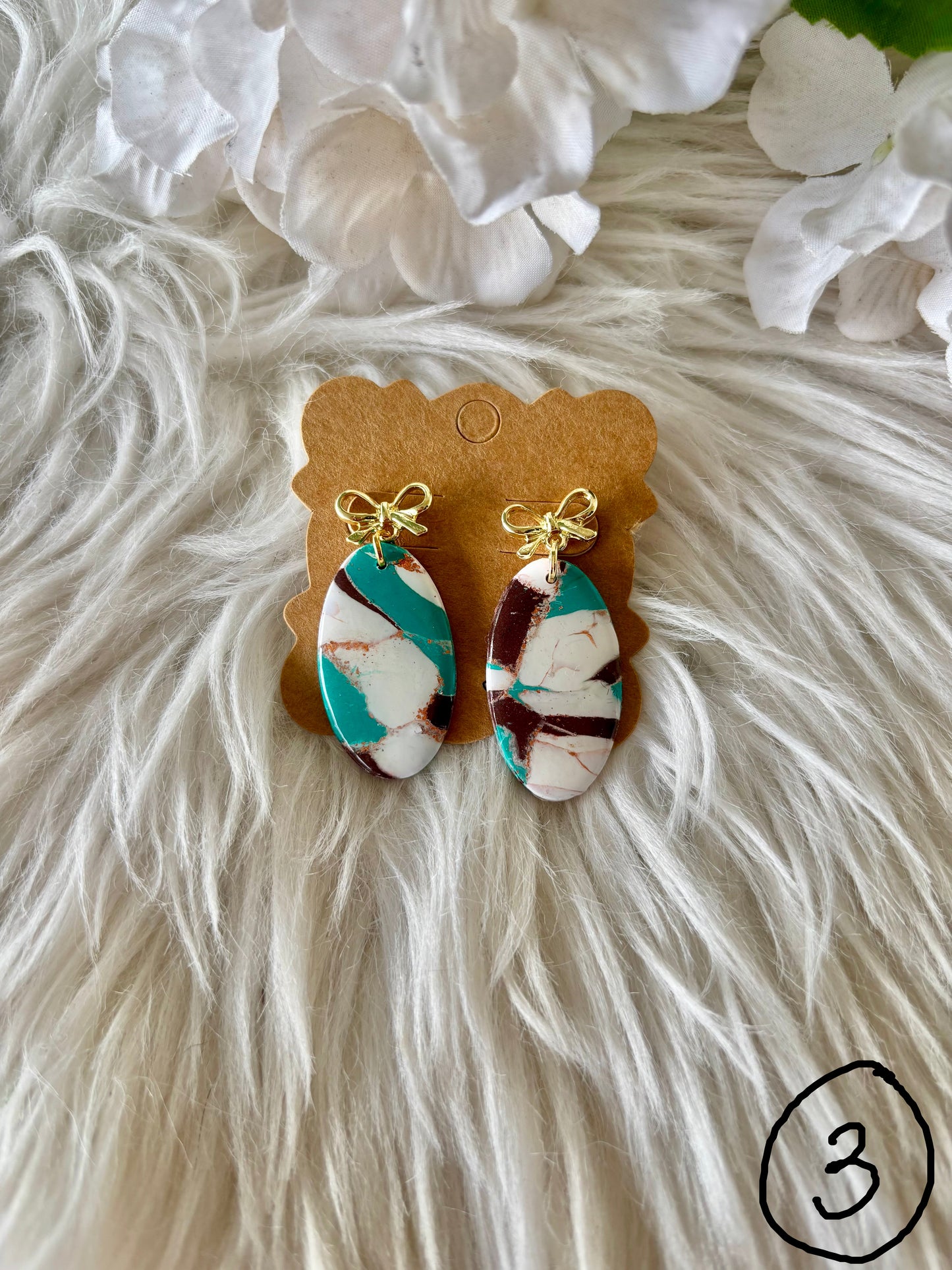 Turquoise, brown and white clay earring collection