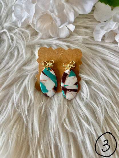 Turquoise, brown and white clay earring collection