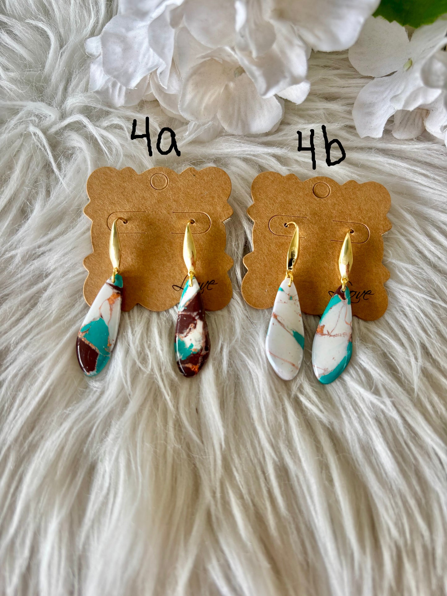 Turquoise, brown and white clay earring collection