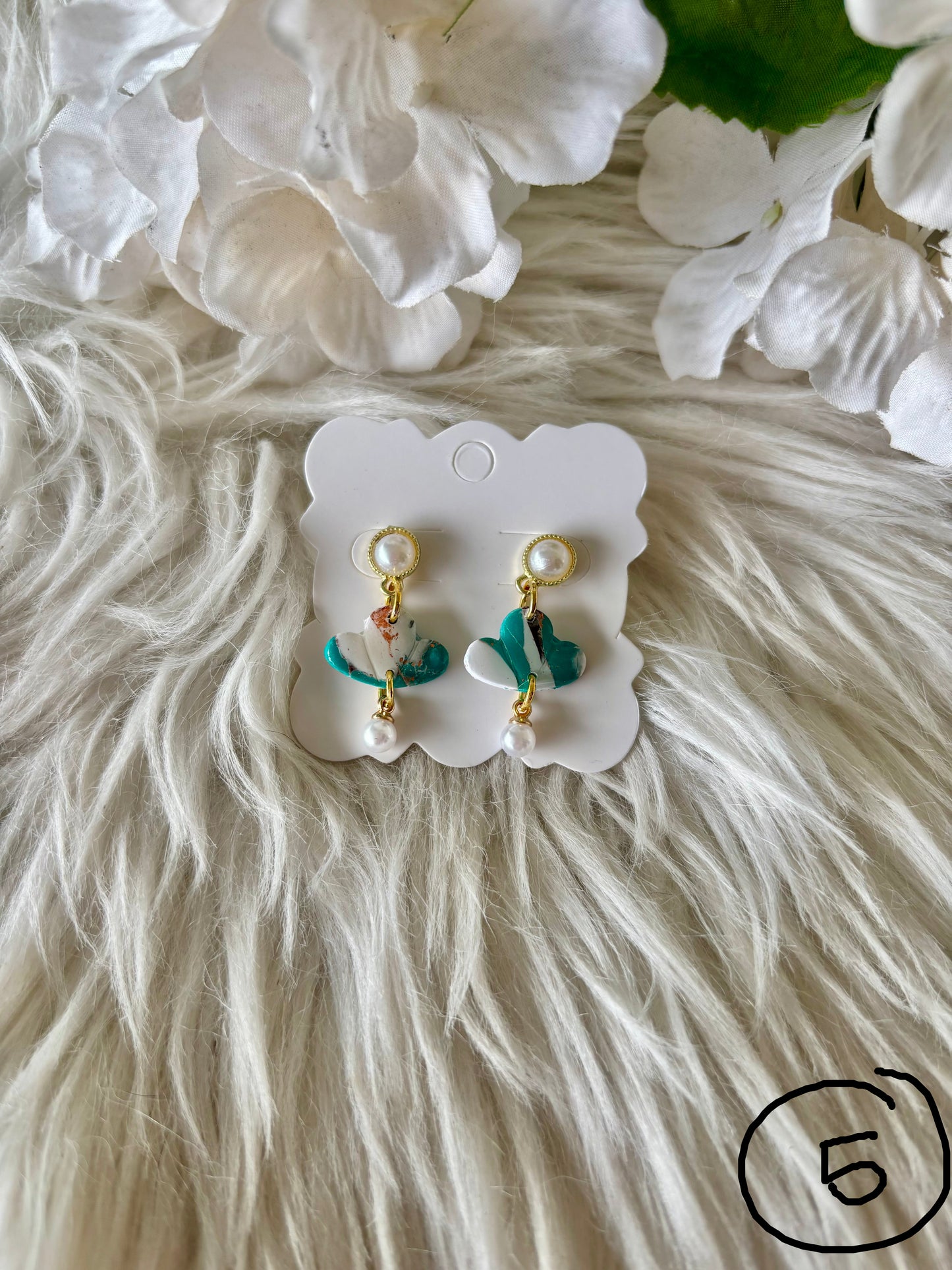 Turquoise, brown and white clay earring collection