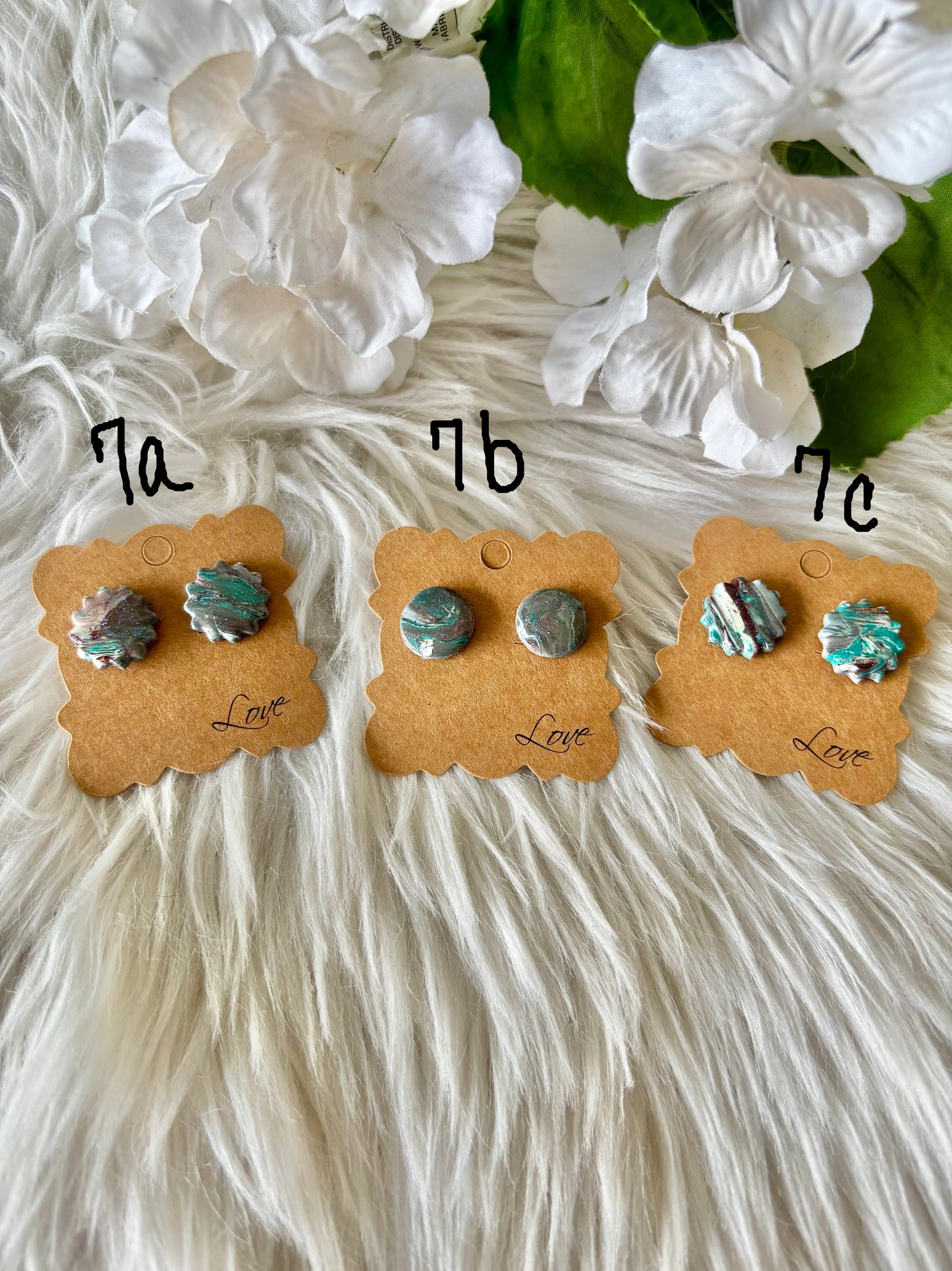 Turquoise, brown and white clay earring collection