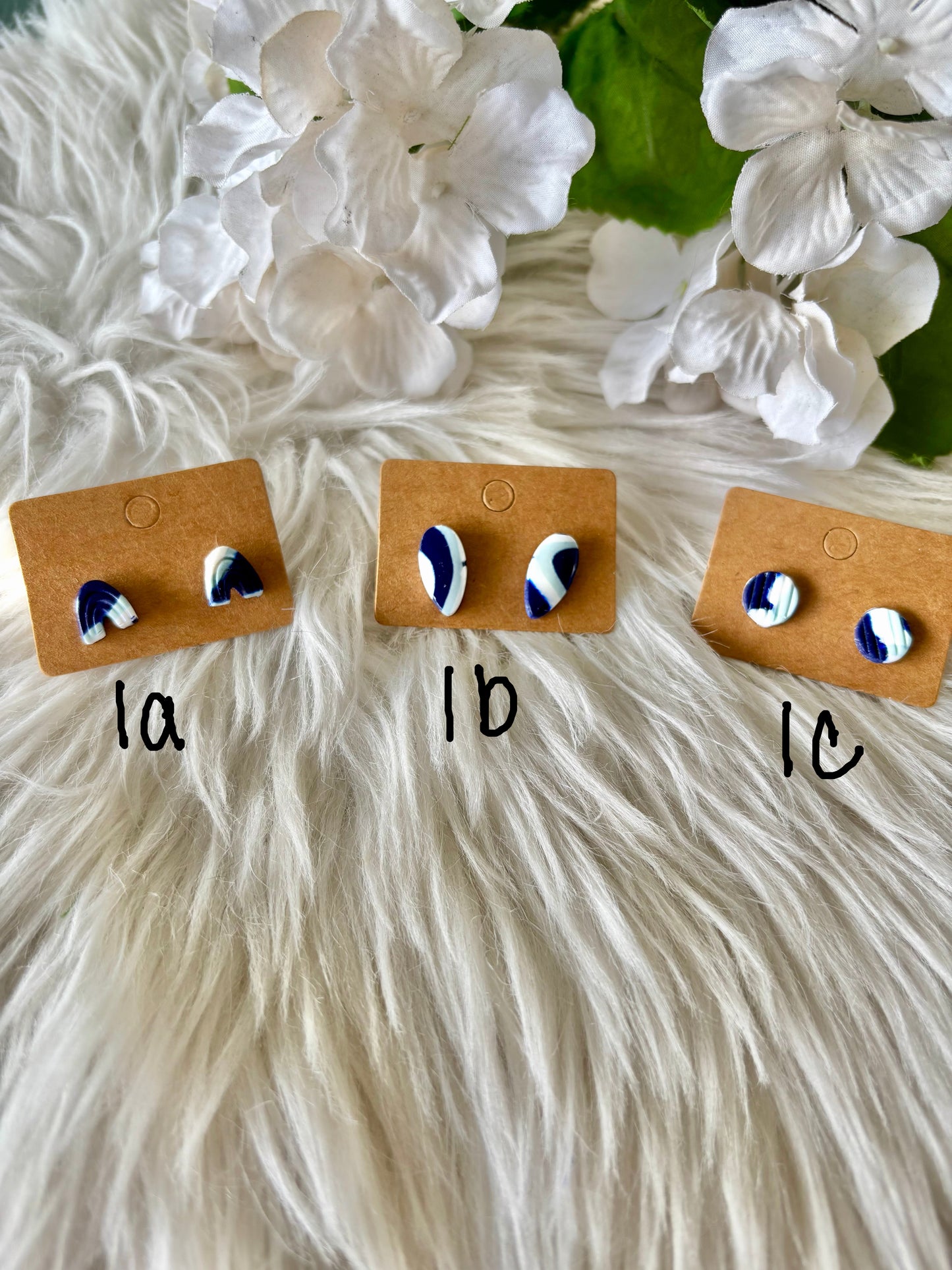 Blue and white clay earring collection