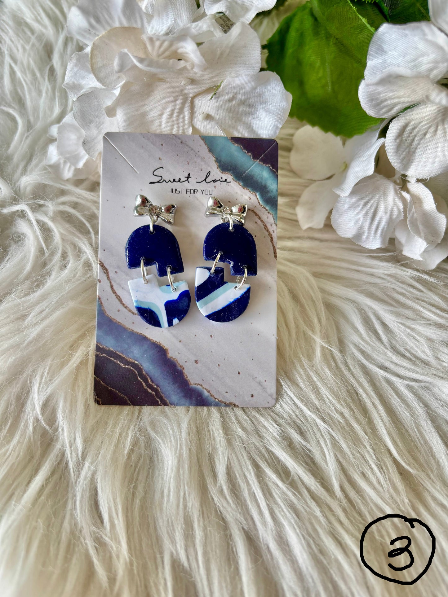 Blue and white clay earring collection