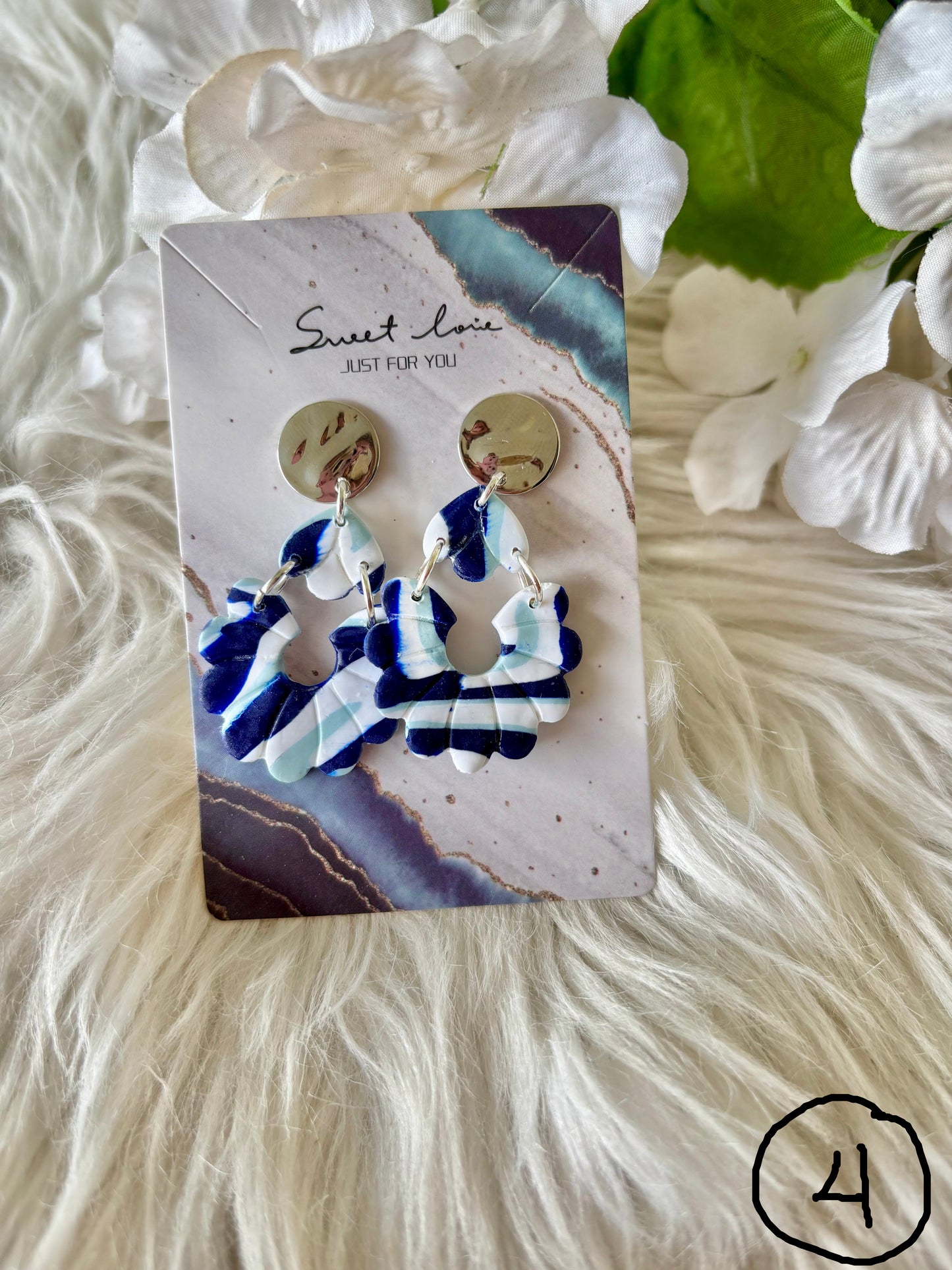 Blue and white clay earring collection