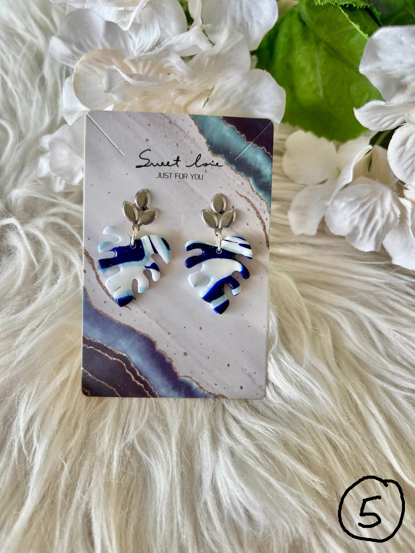 Blue and white clay earring collection