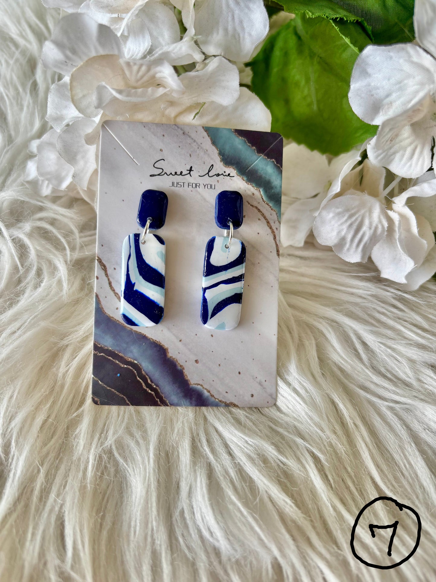 Blue and white clay earring collection