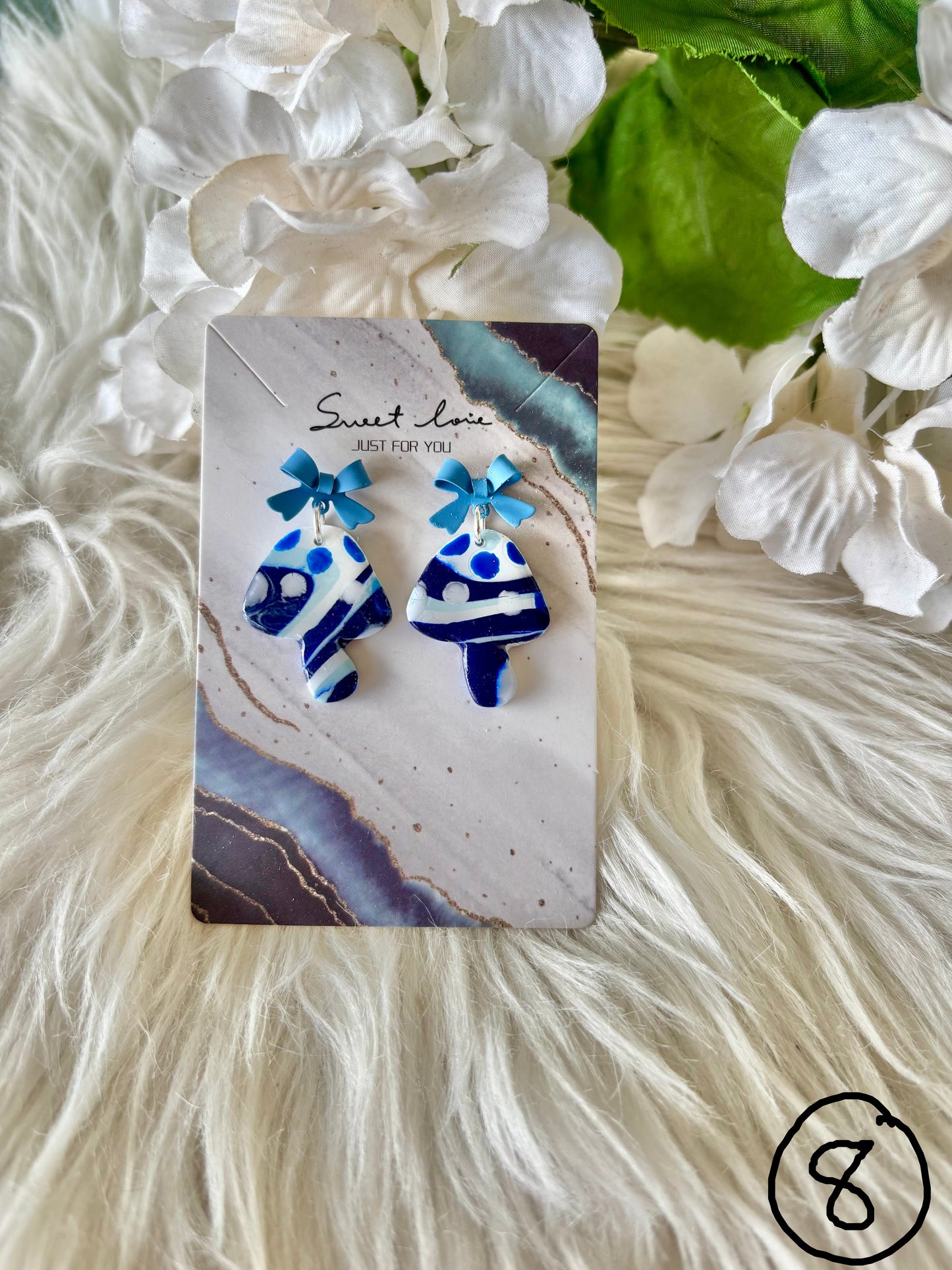 Blue and white clay earring collection
